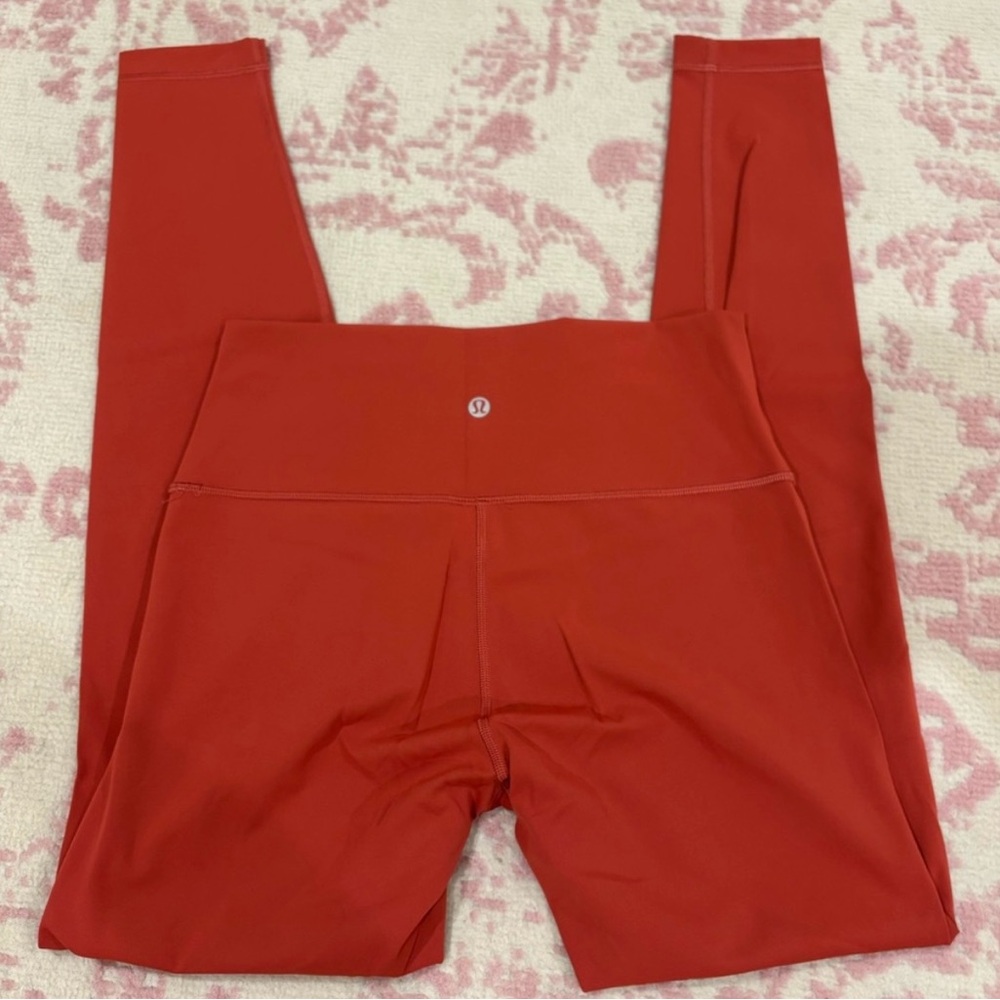 Lululemon Athletica Orange/Burnt
Orange Leggings!!